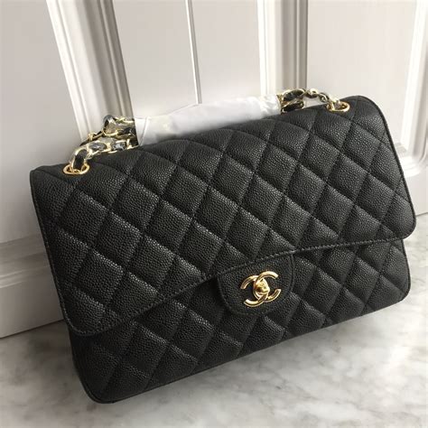 black and gold chanel bag|chanel black classic flap bag.